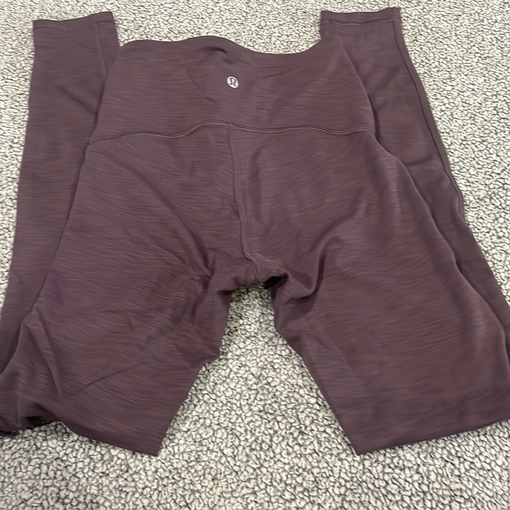 Used eggplant high waisted leggings size 4 Lululemon